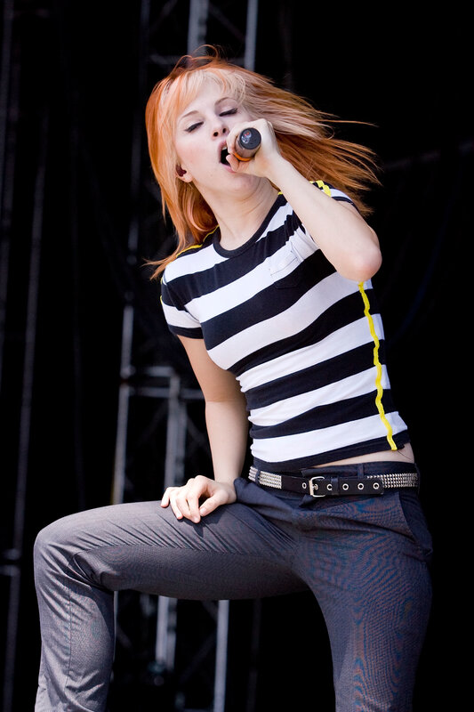Woman singing on stage