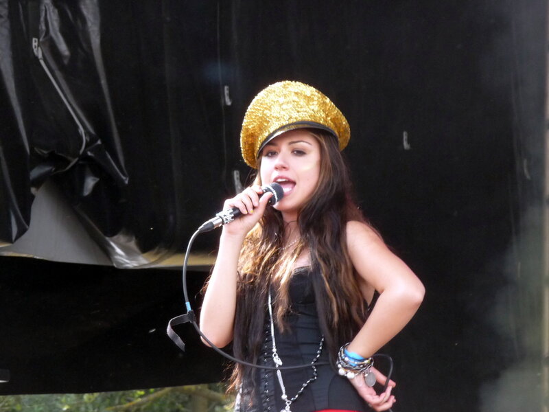 Woman singing on stage