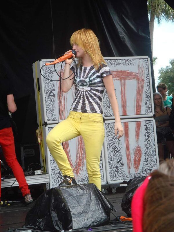 Woman singing on stage
