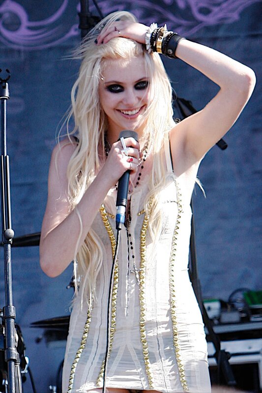 woman singing on stage