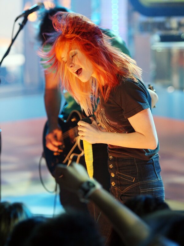 Woman singing on stage