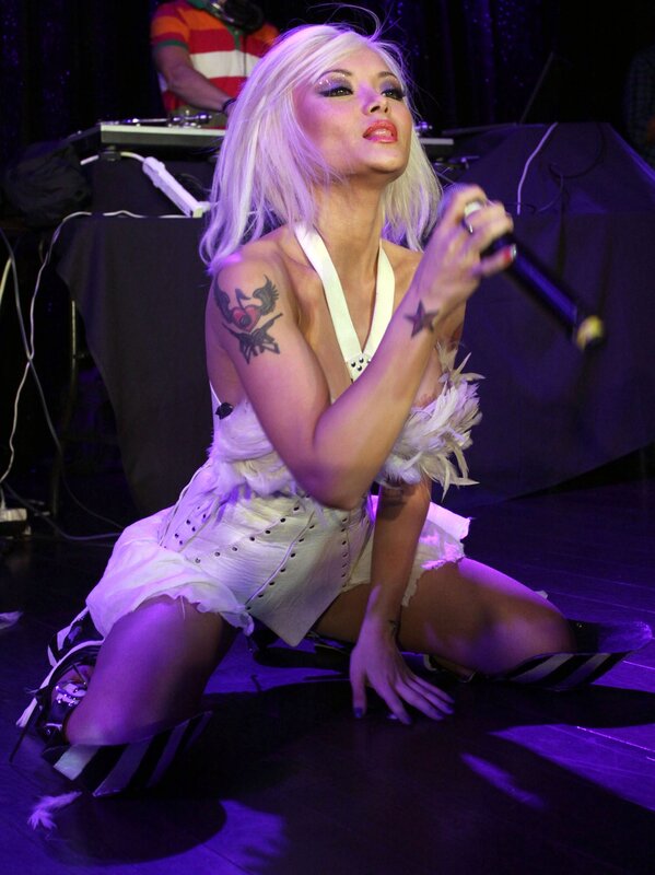 Woman singing on stage