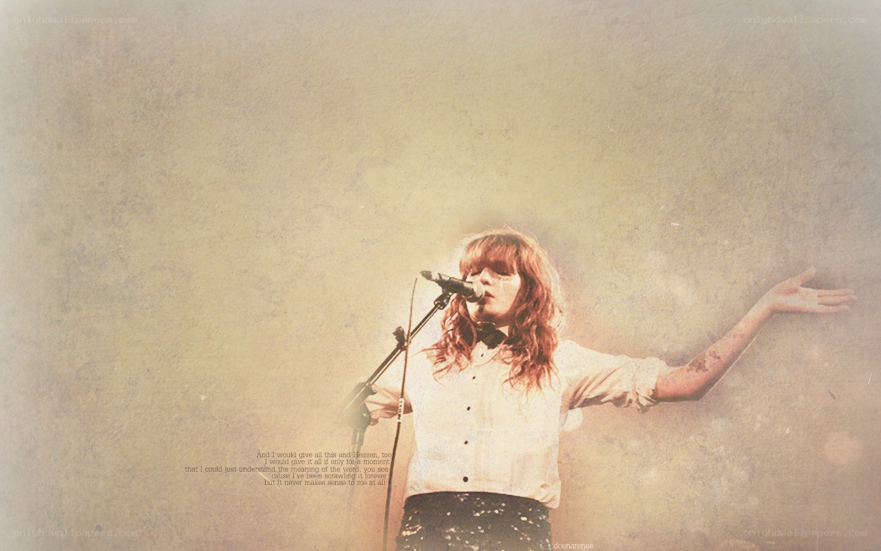 woman singing on stage