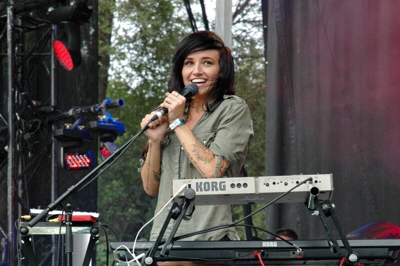 woman singing on stage