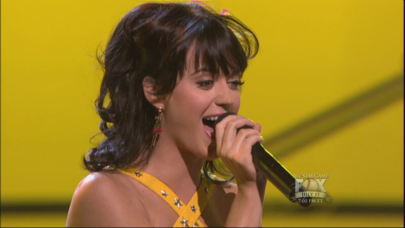 woman singing on stage