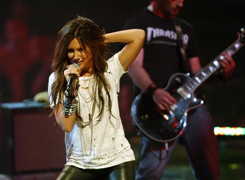 Woman singing on stage