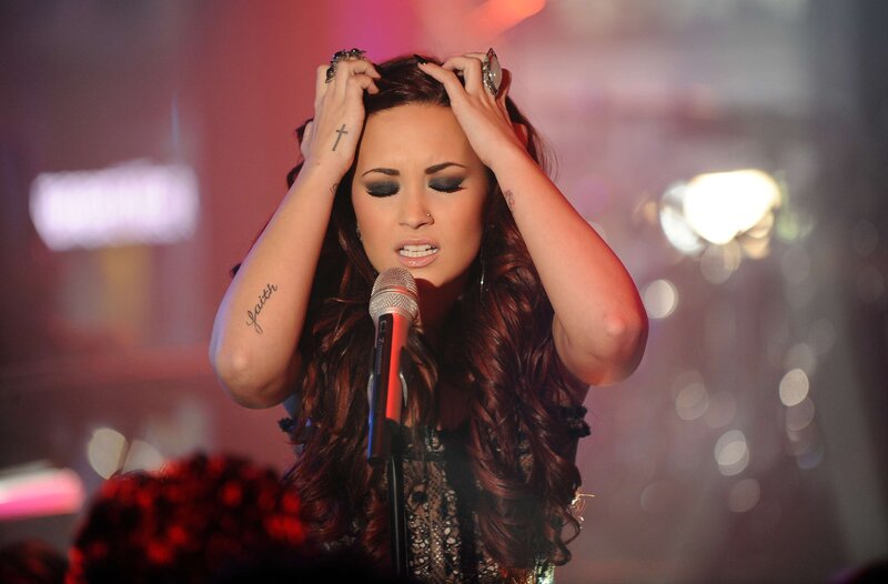 Woman singing on stage
