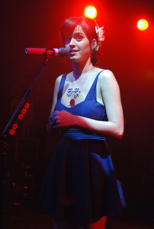 Woman singing on stage
