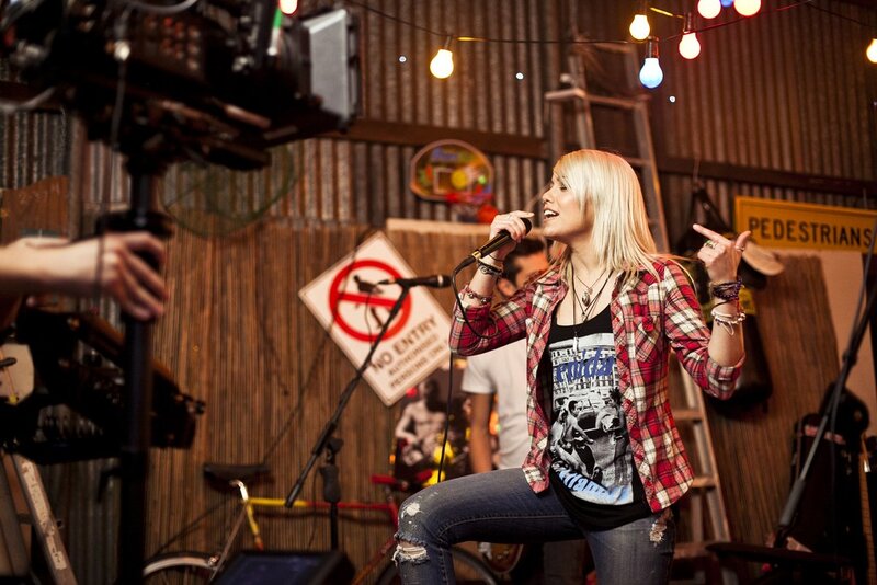 Woman singing on stage