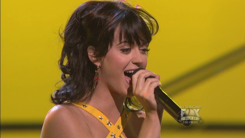 woman singing on stage