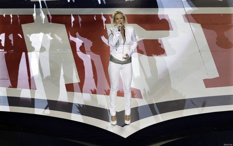 Woman singing on stage