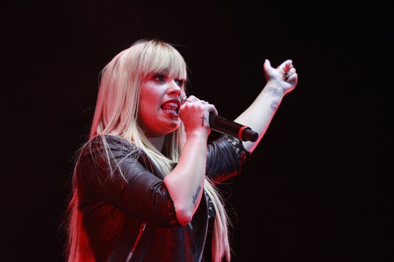 Woman singing on stage