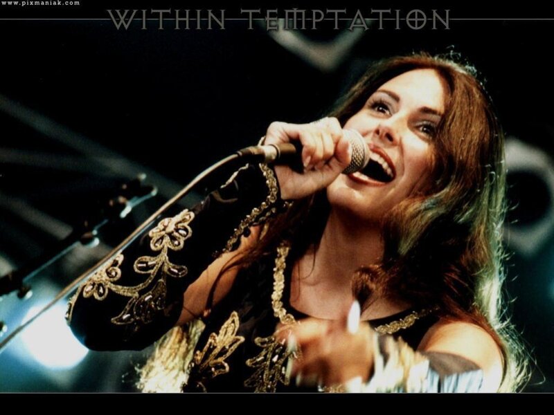 woman singing on stage