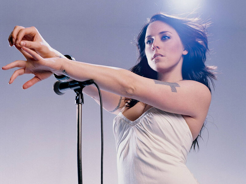 woman singing on stage