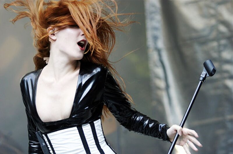 Woman singing on stage