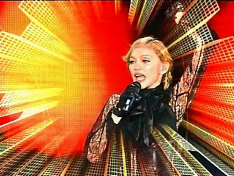 woman singing on stage