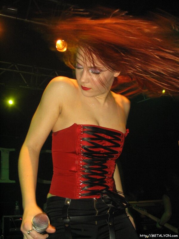 woman singing on stage