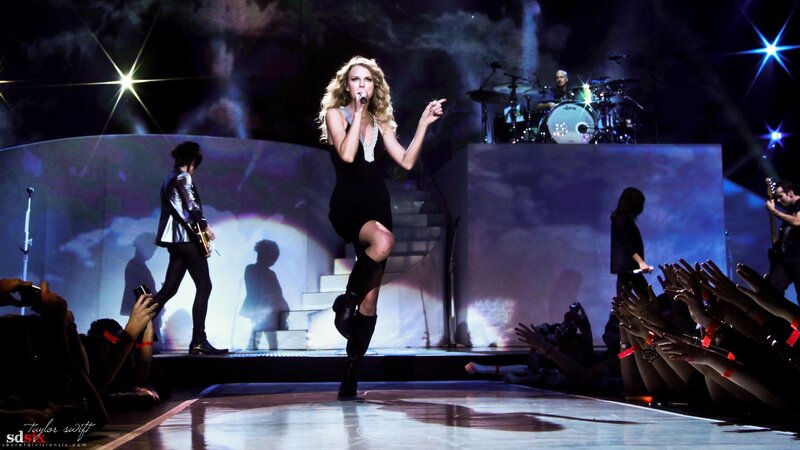 Woman Singing on Stage — Black, Dramatic, Night, Photograph, Band Members, Audience Hands