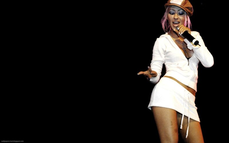 Woman Singing on Stage — Black, Dramatic, Night, Photograph, Microphone, Hat, White Outfit