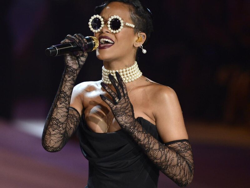 Woman Singing on Stage — Black, Dramatic, Night, Photograph, Microphone, Pearl Necklace