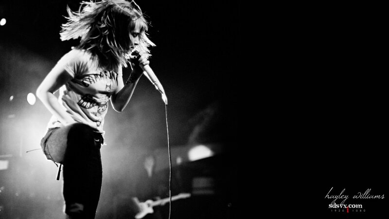 Woman Singing on Stage — Black, Dramatic, Night, Photograph, Microphone, Stage Lights, Smoke, White, Gray