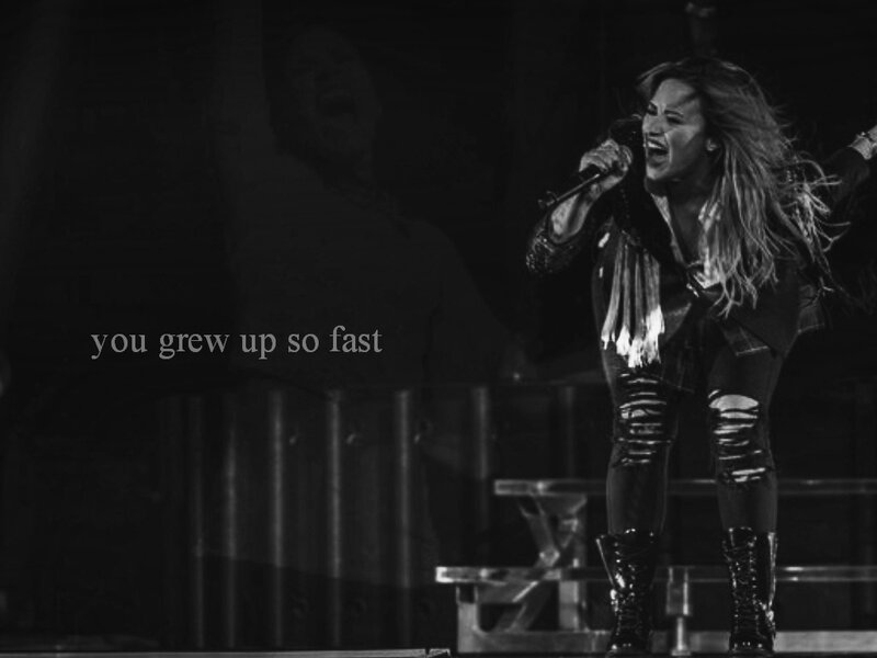 Woman Singing on Stage — Black, Dramatic, Night, Photograph, Microphone, Text
