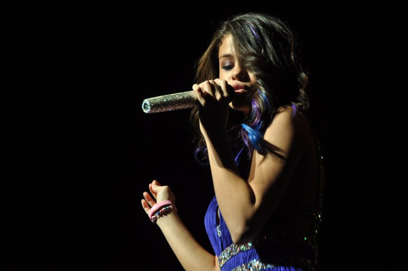 Woman Singing on Stage — Blue, Dramatic, Night, Photograph, Microphone, Dress, Stage Light, Black