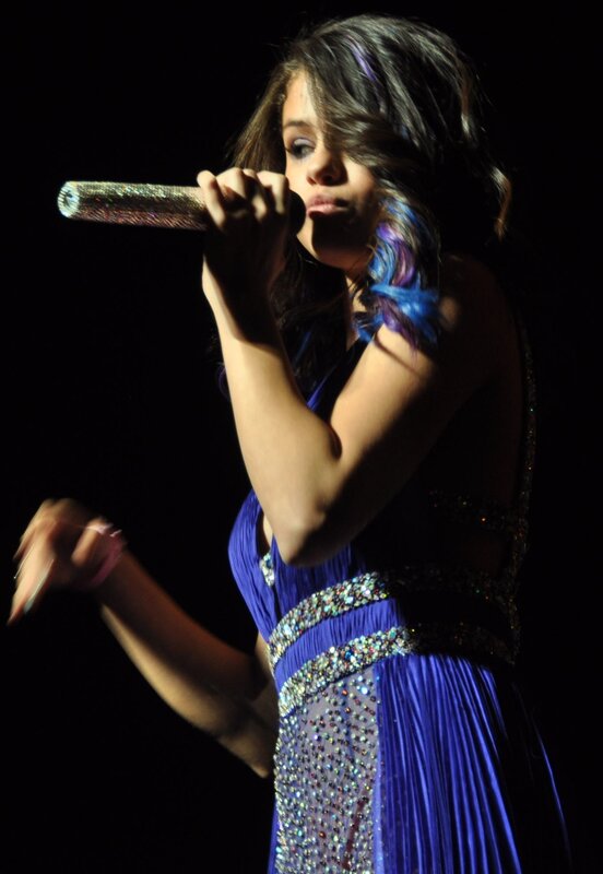 Woman Singing on Stage — Blue, Dramatic, Night, Photograph, Microphone, Dress, Stage Light