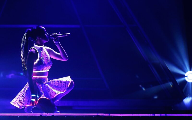 Woman Singing on Stage — Blue, Dramatic, Night, Photograph, Microphone, Stage Lights, Skirt
