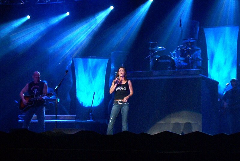 Woman Singing on Stage — Blue, Dramatic, Night