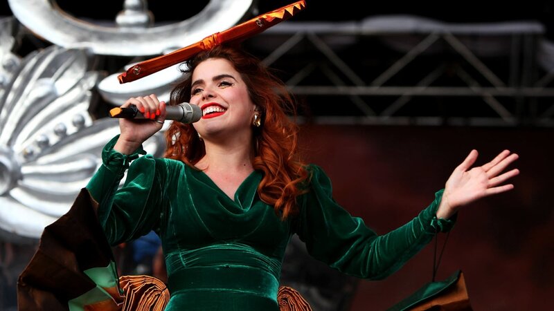 Woman Singing on Stage — Green, Energetic