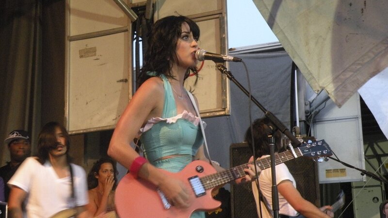 Woman Singing on Stage — Pink, Energetic, Afternoon, Photograph, Guitar