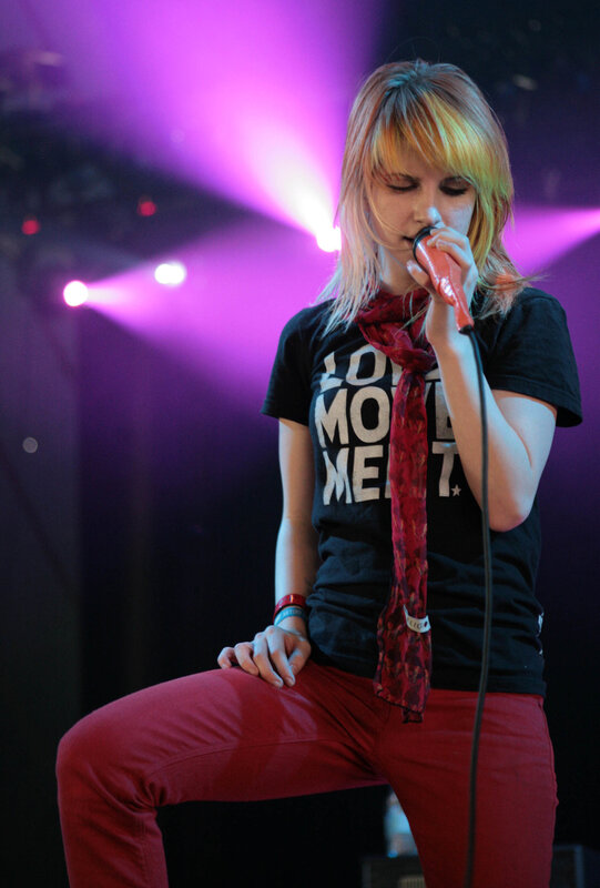 Woman Singing on Stage — Purple, Dramatic, Night, Photograph, Microphone, Scarf