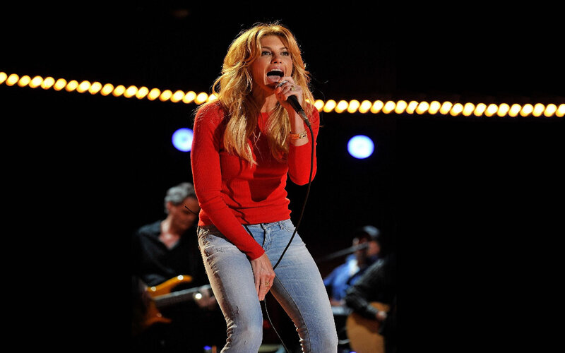 Woman Singing on Stage — Red, Energetic, Night, Photograph, Microphone, Band Members