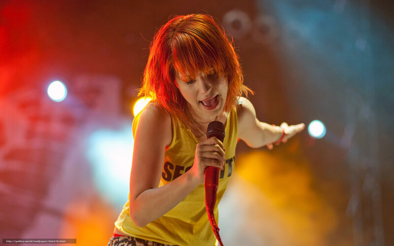 Woman Singing on Stage — Red, Energetic, Night, Photograph, Microphone, Stage Lights