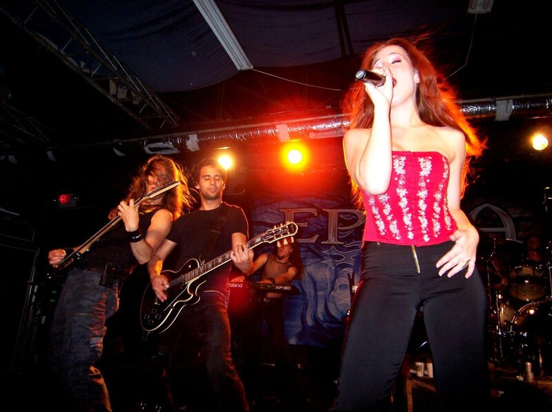 Woman Singing on Stage — Red, Energetic, Night