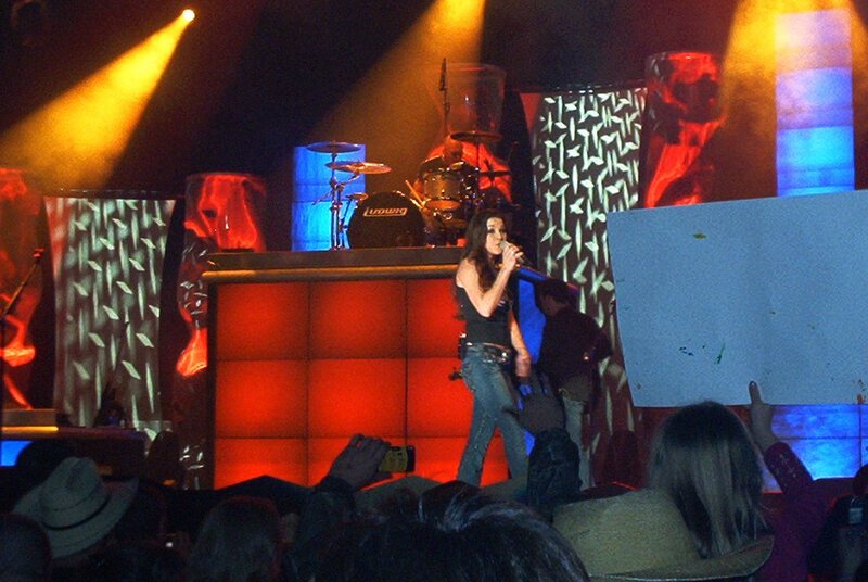 Woman Singing on Stage — Red, Energetic