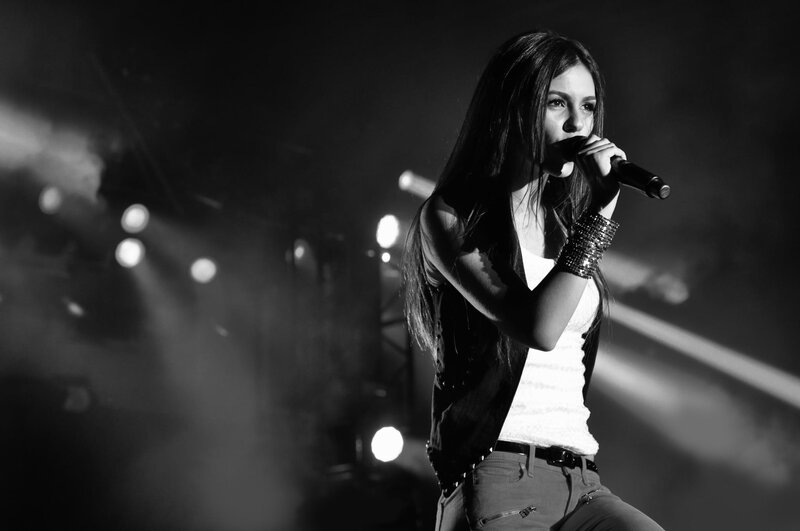 Woman Singing on Stage — Smoke