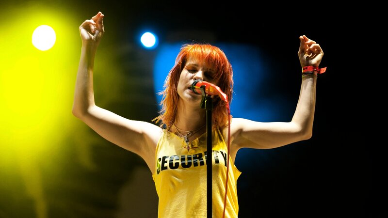 Woman Singing on Stage — Yellow, Energetic, Night