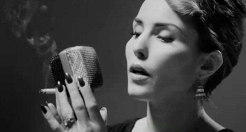 woman singing with cigarette
