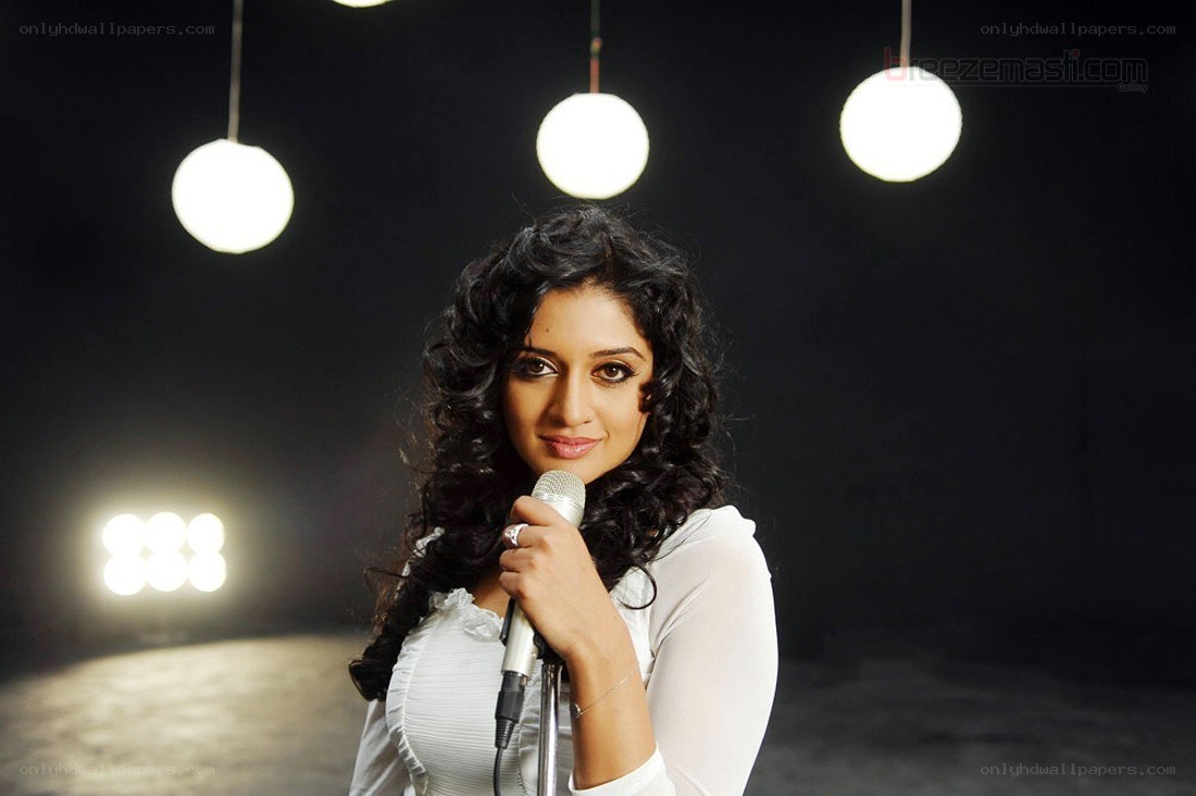 woman singing with microphone