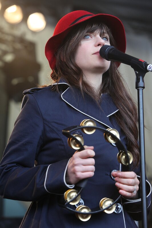 Woman singing with tambourine