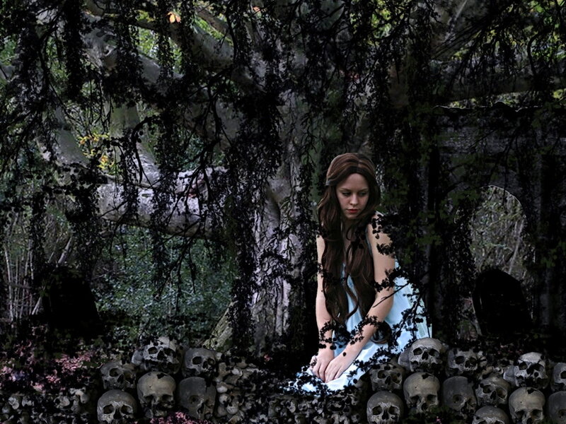 Woman Sitting Among Skulls