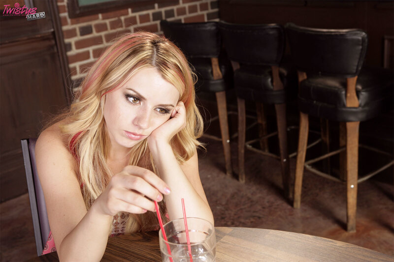 woman sitting at a bar