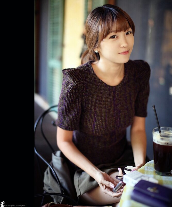 woman sitting at a cafe