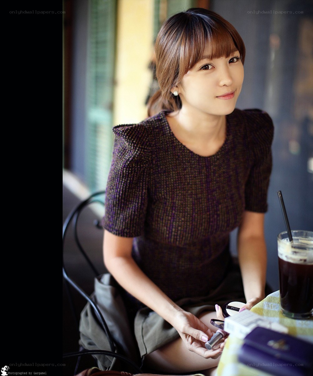 woman sitting at a cafe