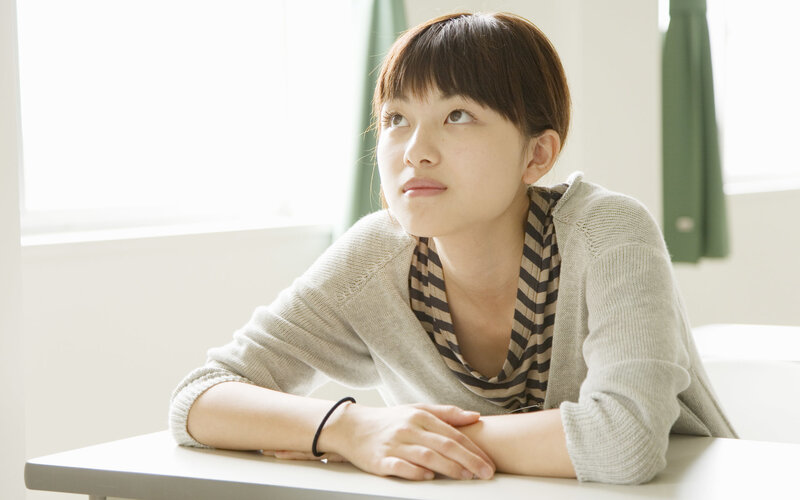 woman sitting at a desk