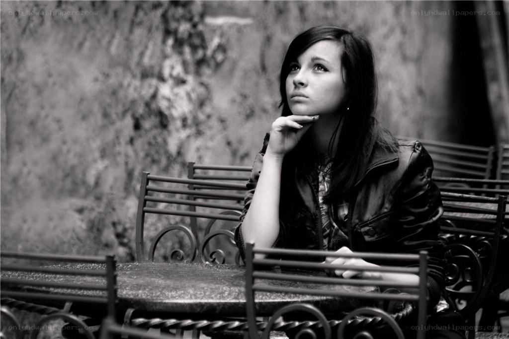 woman sitting at a table