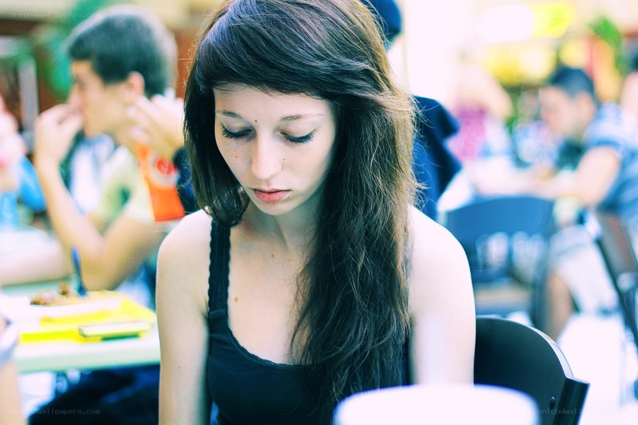 woman sitting at a table