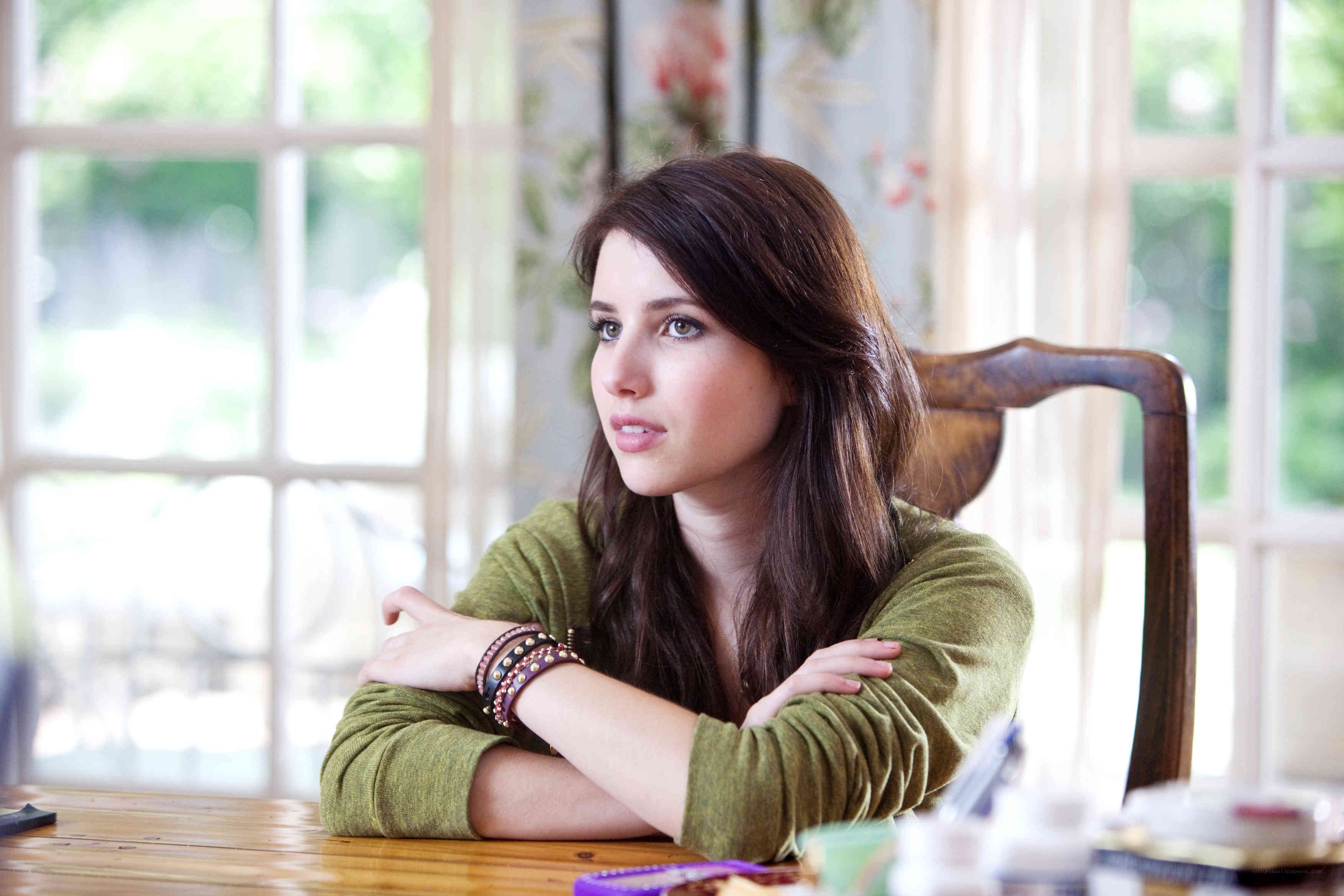 woman sitting at a table